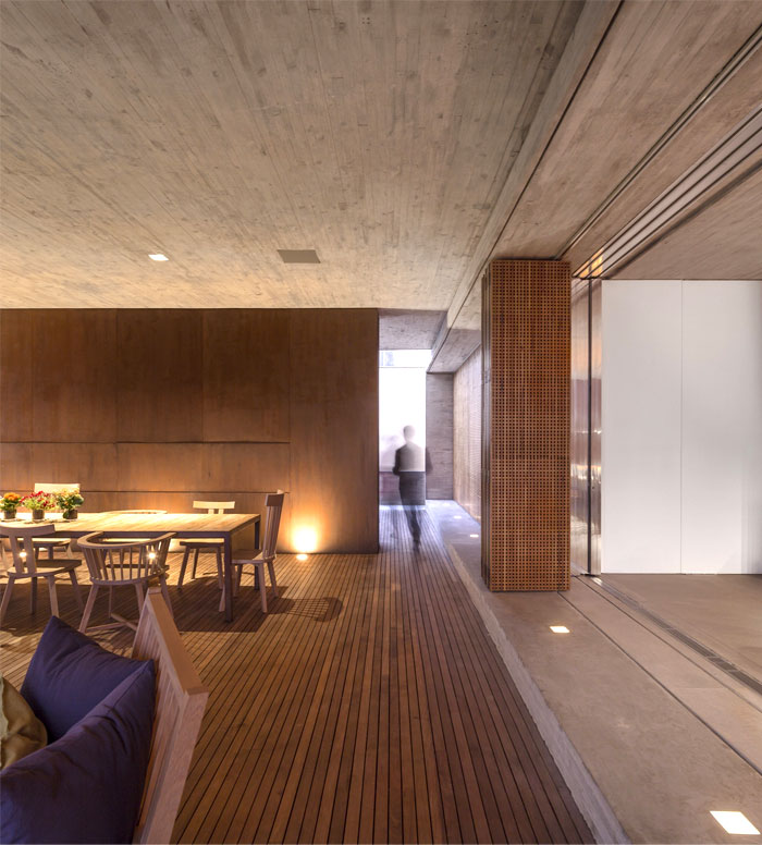 concrete-wall–fireplace-sliding-bamboo-walls