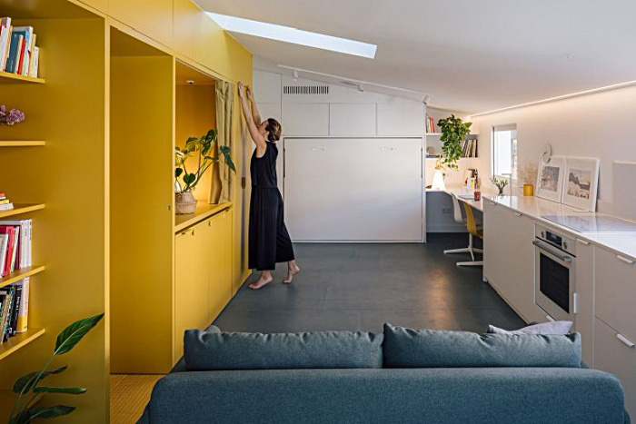 small apartment design in white and yellow gon architects 016