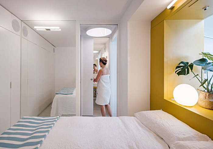 small apartment design in white and yellow gon architects 022